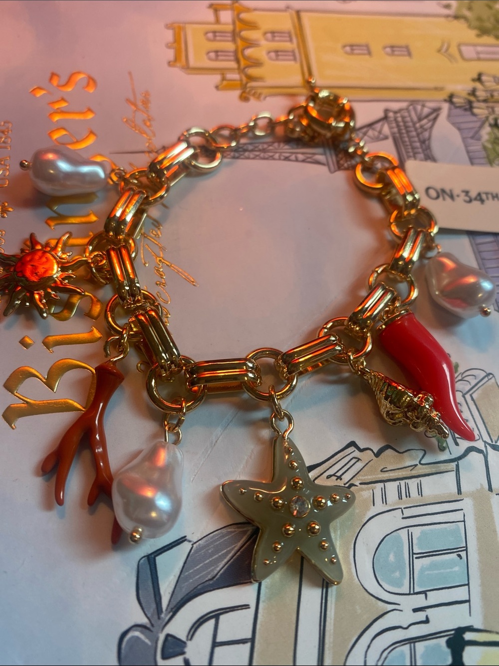 Gold Charm Bracelet with Red Coral, White Pearl & Starfish Charms